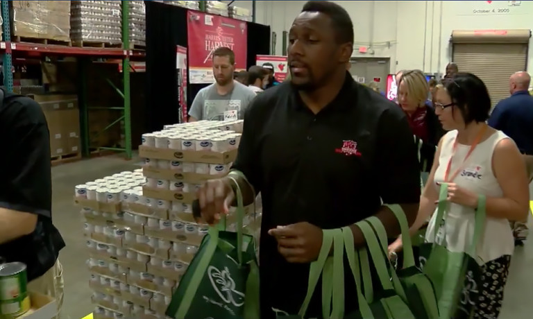 Panthers Players Join Harris Teeter In Giving Out Over 2,000 Thanksgiving Meals To Needy Families