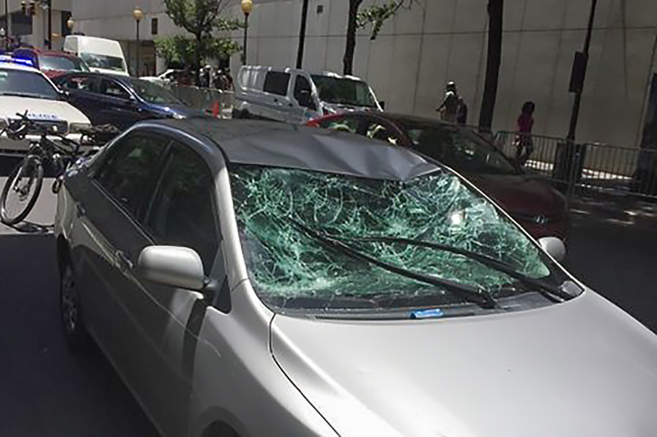 Man Jumps Off Epicenter Skybridge, Crushing The Roof and Windshield Of A Car