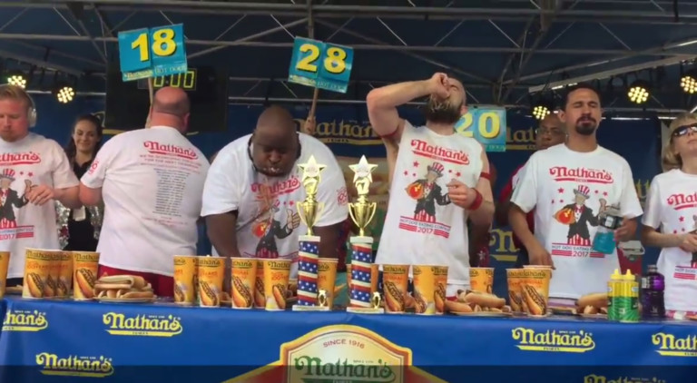 ‘Badlands Booker’ Won Nathan’s Hot Dog Eating Qualifier in Charlotte – Eating 28 in 10 Min. (Video)