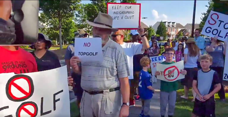 Charlotte Residents March in Protest Against New Topgolf Facility