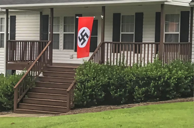 Charlotte Woman Confronts Man Flying Nazi Flag In Front Of His Mt. Holly House (Video)