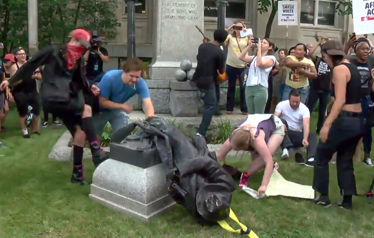 Dozens of Protesters Tear Down Confederate Statue In North Carolina