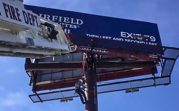 Charlotte Fire Rescues Billboard Worker Moments Before Potentially Fatal Fall (Video)