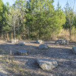 flat branch nature preserve entrance sign rock circle