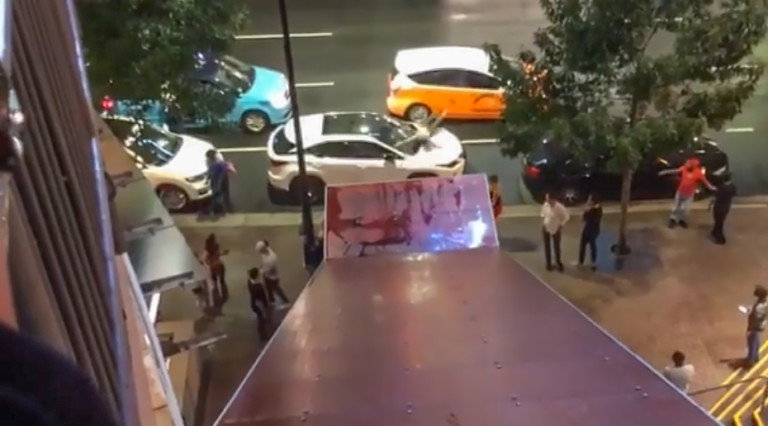 Man Arrested After Sliding Down Epicentre Roof and Damaging Vehicle (Video)