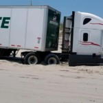 north carolina truck driver gets stuck in the sand