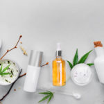 Cosmetics with cannabis CBD oil on light background. Concept natural skin care