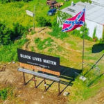 black lives matter next to confederate flag north carolina