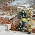 residential high rise building collapse, disaster zone