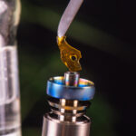 Dabbing tool with small piece of cannabis oil aka shatter – medi