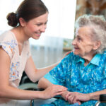 senior woman with home caregiver