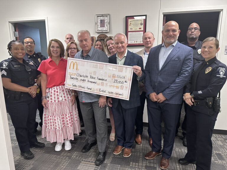 McDonalds Gives CMPD $28,000 For Families of Fallen Officers